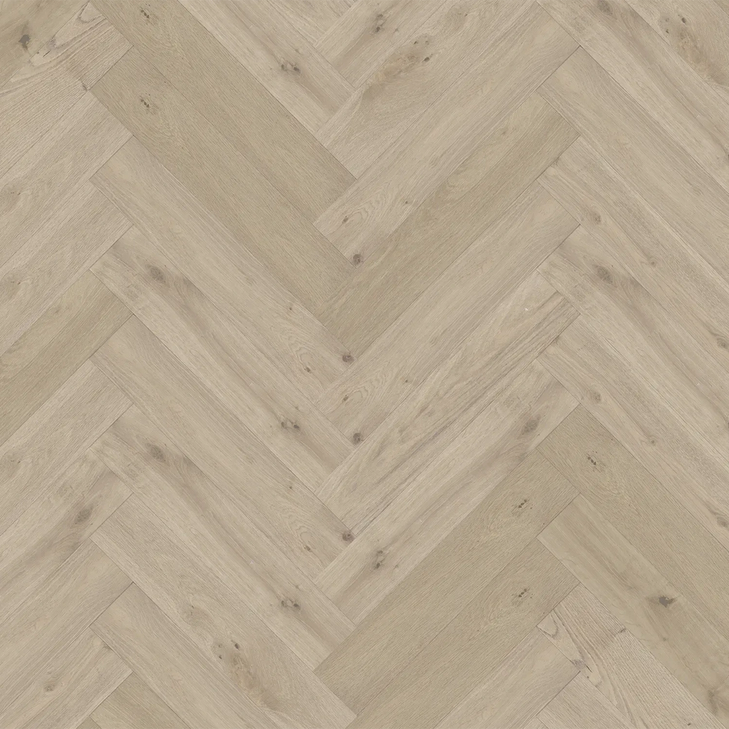 Flooring Global Winds Collection Chinook Herringbone patterned wood with a mix of warm and cool brown tones.